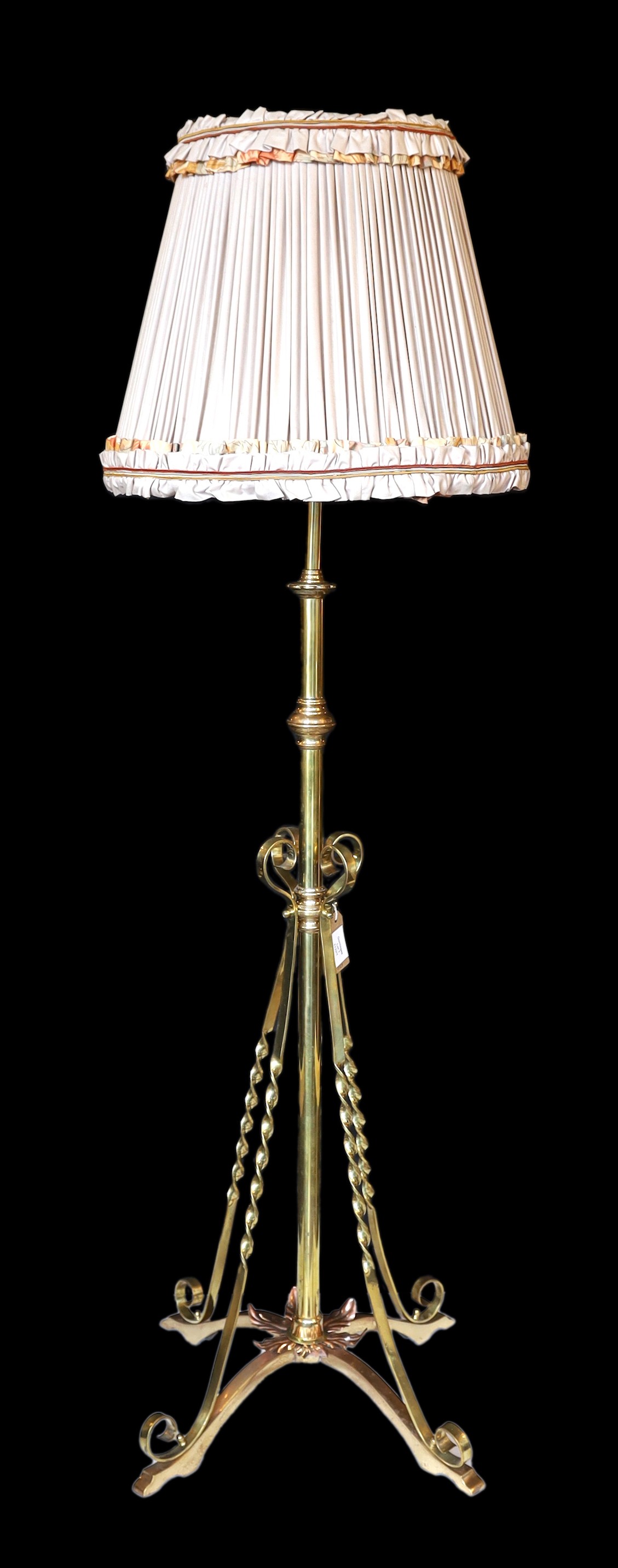 A late 19th century English brass and copper telescopic oil lamp standard converted to electricity, height 145cm. width of base 55cm.